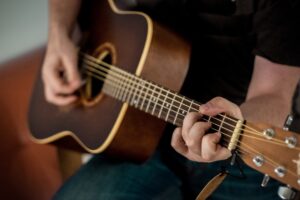Photo by 42 North person playing guitar